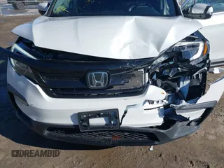 2021 Honda Pilot Special Edition with VIN 5FNYF6H2XMB030592, listed as a IAAI auction lot 41479543 with 16,433 mi miles and . Bid and sale history available at DreamBid. Image 6.