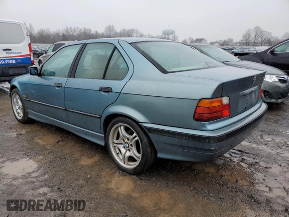 1997 BMW 3 Series 318iA with VIN WBACC0320VEK24863, listed as a Copart auction lot 84966894 with 141,618 mi miles and Clean Title. Bid and sale history available at carsss.com. Image 2.