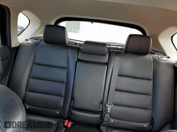 2015 Mazda CX-5 Grand Touring with VIN JM3KE4DY2F0480639, listed as a Copart auction lot 75248594 with 104,652 mi miles and Non Repairable. Bid and sale history available at carsss.com. Image 10.