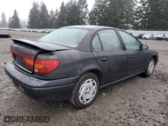 2000 Saturn SL with VIN 1G8ZK5270YZ269898, listed as a Copart auction lot 88082365 with 124,233 mi miles and Salvage title. Bid and sale history available at DreamBid. Image 3.