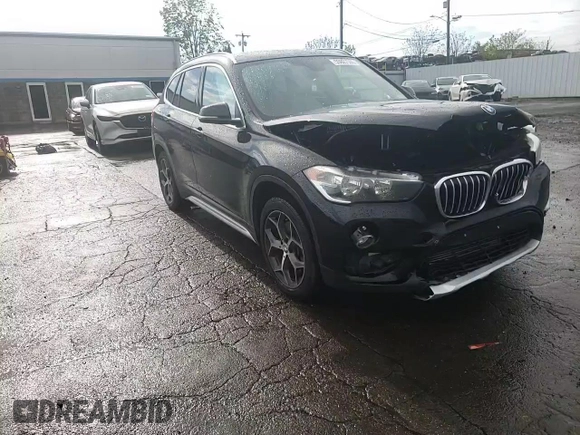 2018 BMW X1 xDrive28i with VIN WBXHT3C35J3H30946, listed as a Copart auction lot 55927505 with 69,626 mi miles and Salvage title. Bid and sale history available at DreamBid. Image 13.