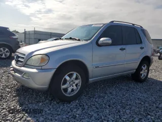 2004 Mercedes-Benz M 350 with VIN 4JGAB57E74A488498, listed as a Copart auction lot 55344595 with 173,338 mi miles and Salvage title. Bid and sale history available at DreamBid. Image 1.