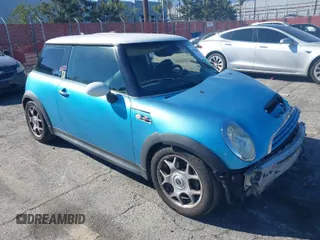 2005 MINI Hardtop S with VIN WMWRE33455TD98708, listed as a IAAI auction lot 41845535 with 154,656 mi miles and . Bid and sale history available at DreamBid. Image 1.