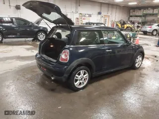 2012 MINI Cooper Hardtop with VIN WMWSU3C54CT543292, listed as a IAAI auction lot 41419223 with 118,487 mi miles. Bid and sale history available at carsss.com. Image 4.