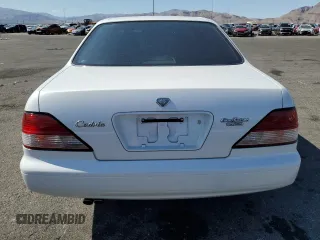1996 Nissan Cedric z VIN HY33249241, wystawiony jako Copart lot #57869775 z przebiegiem 121 233 mil mil oraz Szkoda całkowita • Salvage title. Historia ofert i sprzedaży dostępna na DreamBid. Obrazek 6.