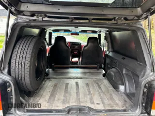 1997 Jeep Cherokee with VIN 1J4FT67S6VL571732, listed as a Copart auction lot 61440245 with 153,147 mi miles and Clean title. Bid and sale history available at DreamBid. Image 6.