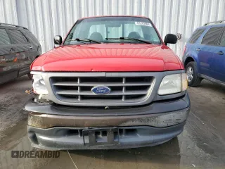 2001 Ford F-150 XL z VIN 3FTZF17291MA72686, wystawiony jako Copart lot #83103904 z przebiegiem 126 018 mil mil oraz Szkoda całkowita • Salvage title. Historia ofert i sprzedaży dostępna na DreamBid. Obrazek 5.