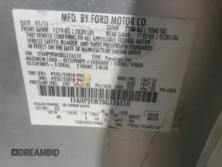 2011 Ford Taurus SEL z VIN 1FAHP2EW2BG176510, wystawiony jako Copart lot #51081085 z przebiegiem 261 031 mil mil oraz Szkoda całkowita • Salvage title. Historia ofert i sprzedaży dostępna na DreamBid. Obrazek 12.