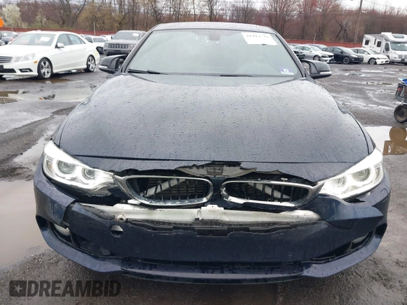 2016 BMW 4 Series 428i xDrive with VIN WBA4C9C59GG137067, listed as a IAAI auction lot 41913733 with 104,378 mi miles and . Bid and sale history available at carsss.com. Image 6.