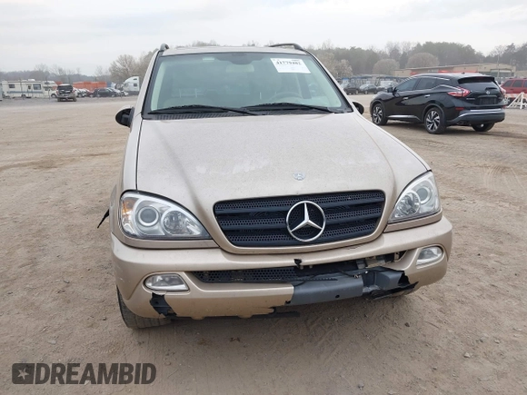2002 Mercedes-Benz M 320/430/500 z VIN 4JGAB54E82A308902, wystawiony jako IAAI lot #41779482 z przebiegiem 99 933 mil mil oraz . Historia ofert i sprzedaży dostępna na DreamBid. Obrazek 6.