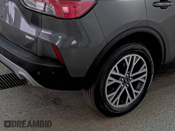 2020 Ford Escape SEL z VIN 1FMCU9H60LUB11753, wystawiony jako IAAI lot #42516624 z przebiegiem 75 781 mil mil oraz . Historia ofert i sprzedaży dostępna na DreamBid. Obrazek 1.