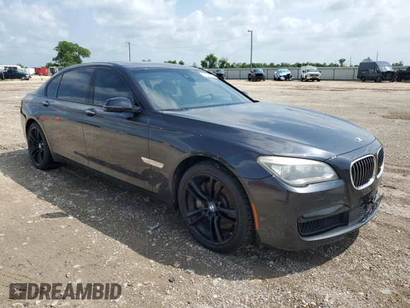 2015 BMW 7 Series 750Li z VIN WBAYE8C51FD782155, wystawiony jako Copart lot #54796505 z przebiegiem 112 772 mil mil oraz Szkoda całkowita • Salvage title. Historia ofert i sprzedaży dostępna na DreamBid. Obrazek 4.