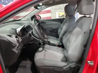 2015 Chevrolet Sonic LS with VIN 1G1JA6SH5F4163373, listed as a Copart auction lot 51759005 with 54,704 mi miles and Salvage title. Bid and sale history available at DreamBid. Image 7.