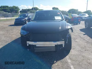 2023 Audi Q5 S line Premium Plus z VIN WA1EAAFY5P2128250, wystawiony jako IAAI lot #40666613 z przebiegiem 27 940 mil mil oraz . Historia ofert i sprzedaży dostępna na DreamBid. Obrazek 6.