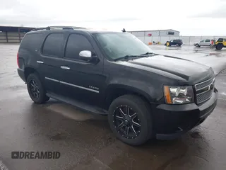 2013 Chevrolet Tahoe LTZ with VIN 1GNSKCE0XDR130910, listed as a IAAI auction lot 41951352 with 188,850 mi miles and . Bid and sale history available at DreamBid. Image 1.