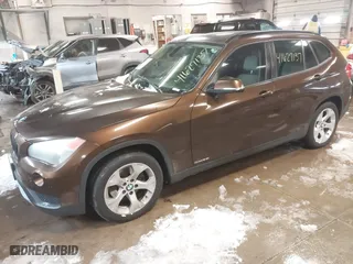 2013 BMW X1 28i with VIN WBAVM1C59DVW42455, listed as a IAAI auction lot 41627137 with 170,120 mi miles. Bid and sale history available at carsss.com. Image 2.