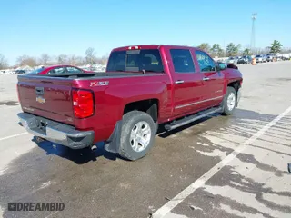 2014 Chevrolet Silverado 1500 LTZ with VIN 3GCUKSEC5EG364458, listed as a IAAI auction lot 41857739 with 85,042 mi miles. Bid and sale history available at carsss.com. Image 4.