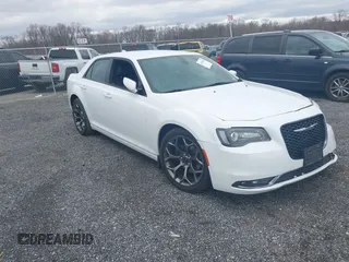 2015 Chrysler 300 with VIN 2C3CCABG5FH743265, listed as a IAAI auction lot 41743051 with 132,856 mi miles. Bid and sale history available at carsss.com. Image 1.