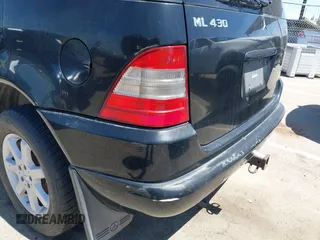 2000 Mercedes-Benz M 320/430/500 z VIN 4JGAB72E0YA203293, wystawiony jako IAAI lot #42257048 z przebiegiem 274 082 mil mil oraz . Historia ofert i sprzedaży dostępna na DreamBid. Obrazek 6.