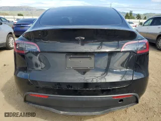 2022 Tesla Model Y Long Range with VIN 7SAYGDEE2NF575433, listed as a Copart auction lot 47576175 with 53,642 mi miles and Salvage Title. Bid and sale history available at carsss.com. Image 6.