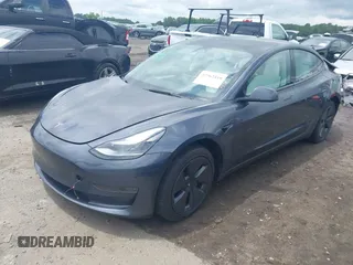 2023 Tesla Model 3 with VIN 5YJ3E1EAXPF628911, listed as a IAAI auction lot 42362410 with 25,387 mi miles and . Bid and sale history available at DreamBid. Image 2.