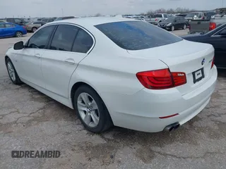2013 BMW 5 Series 528i with VIN WBAXG5C55DDY33772, listed as a IAAI auction lot 41605701 with 131,473 mi miles and . Bid and sale history available at carsss.com. Image 3.