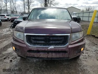 2010 Honda Ridgeline RT with VIN 5FPYK1F23AB008602, listed as a Copart auction lot 52180695 with 144,878 mi miles and Salvage Title. Bid and sale history available at carsss.com. Image 5.