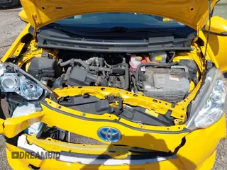 2014 Toyota Prius One z VIN JTDKDTB31E1066984, wystawiony jako IAAI lot #42261574 z przebiegiem 163 378 mil mil oraz . Historia ofert i sprzedaży dostępna na DreamBid. Obrazek 10.
