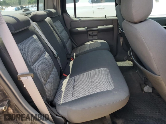 2005 Ford Explorer Sport Trac XLS with VIN 1FMZU67K65UA29830, listed as a Copart auction lot 54941185 with 214,220 mi miles and Salvage title. Bid and sale history available at DreamBid. Image 10.