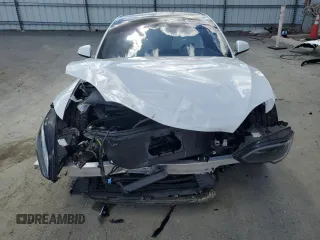 2022 Tesla Model S z VIN 5YJSA1E57NF474679, wystawiony jako Copart lot #56608285 z przebiegiem Nie podano mil oraz Szkoda całkowita • Salvage title. Historia ofert i sprzedaży dostępna na DreamBid. Obrazek 5.