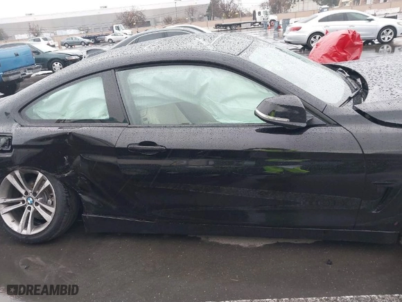 2015 BMW 4 Series 428i with VIN WBA3N7C57FK222351, listed as a IAAI auction lot 41490737 with 99,322 mi miles. Bid and sale history available at carsss.com. Image 13.