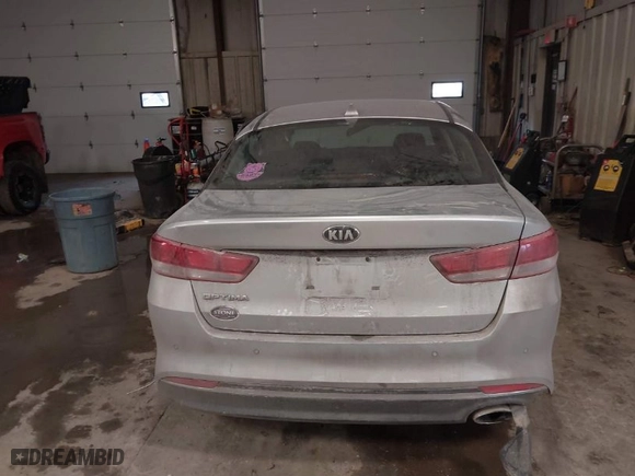 2018 Kia Optima S with VIN 5XXGT4L35JG263409, listed as a IAAI auction lot 41646396 with 97,793 mi miles. Bid and sale history available at carsss.com. Image 16.