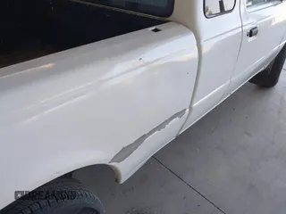 2000 Ford Ranger XL with VIN 1FTYR14VXYTB24131, listed as a IAAI auction lot 42182292 with 263,211 mi miles. Bid and sale history available at carsss.com. Image 6.