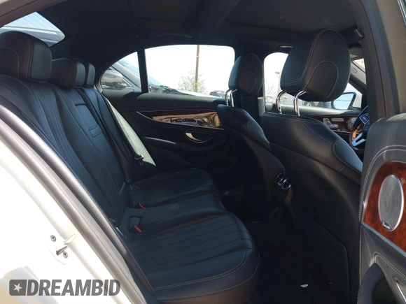 2019 Mercedes-Benz E-Class E 300 with VIN WDDZF4JBXKA597397, listed as a IAAI auction lot 41724672 with 99,258 mi miles. Bid and sale history available at carsss.com. Image 8.