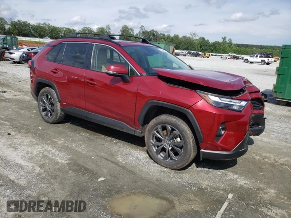 2023 Toyota RAV4 Hybrid XLE Premium with VIN JTMB6RFV2PD541262, listed as a Copart auction lot 60106845 with 32,447 mi miles and Salvage title. Bid and sale history available at DreamBid. Image 4.