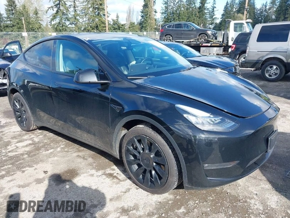 2022 Tesla Model Y Long Range with VIN 7SAYGDEEXNF459834, listed as a IAAI auction lot 42004576 with 56,175 mi miles and . Bid and sale history available at carsss.com. Image 1.