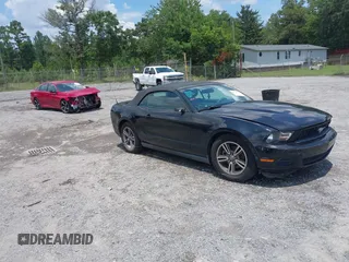 2012 Ford Mustang V6 with VIN 1ZVBP8EM2C5235213, listed as a IAAI auction lot 42635366 with 93,659 mi miles and . Bid and sale history available at DreamBid. Image 1.