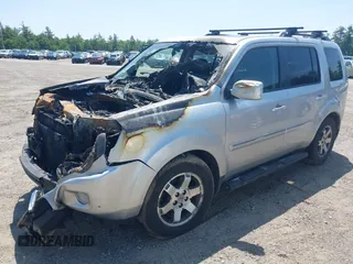 2010 Honda Pilot Touring z VIN 5FNYF4H94AB010058, wystawiony jako IAAI lot #42495313 z przebiegiem 157 306 mil mil oraz . Historia ofert i sprzedaży dostępna na DreamBid. Obrazek 2.