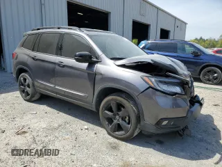 2021 Honda Passport Elite with VIN 5FNYF8H08MB014398, listed as a Copart auction lot 50499375 with 52,550 mi miles and Salvage Title. Bid and sale history available at carsss.com. Image 4.
