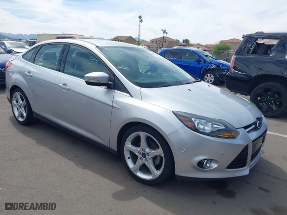 2012 Ford Focus Titanium with VIN 1FAHP3J29CL262348, listed as a IAAI auction lot 41812310 with 81,645 mi miles. Bid and sale history available at carsss.com. Image 1.