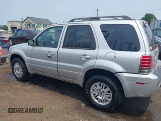 2005 Mercury Mariner Luxury z VIN 4M2CU57135DJ23718, wystawiony jako IAAI lot #42441869 z przebiegiem 179 378 mil mil oraz . Historia ofert i sprzedaży dostępna na DreamBid. Obrazek 14.