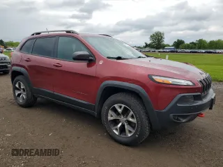 2014 Jeep Cherokee Trailhawk z VIN 1C4PJMBS2EW130125, wystawiony jako Copart lot #57830635 z przebiegiem 117 811 mil mil oraz Szkody całkowita. Historia ofert i sprzedaży dostępna na DreamBid. Obrazek 4.