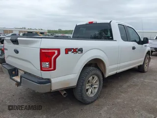 2017 Ford F-150 XL with VIN 1FTFX1EF0HFA09802, listed as a IAAI auction lot 42062781 with 124,279 mi miles. Bid and sale history available at carsss.com. Image 4.