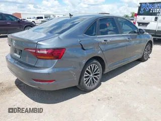 2019 Volkswagen Jetta S z VIN 3VWC57BUXKM061537, wystawiony jako IAAI lot #42170921 z przebiegiem 88 476 mil mil oraz . Historia ofert i sprzedaży dostępna na DreamBid. Obrazek 4.
