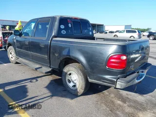 2001 Ford F-150 XLT z VIN 1FTRW07L61KC53030, wystawiony jako IAAI lot #42526499 z przebiegiem 121 675 mil mil oraz . Historia ofert i sprzedaży dostępna na DreamBid. Obrazek 3.