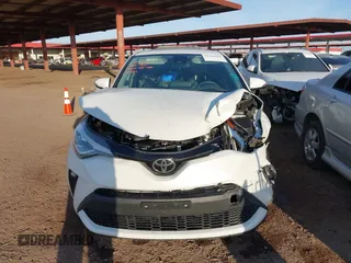 2021 Toyota C-HR LE with VIN JTNKHMBX3M1114590, listed as a IAAI auction lot 41560459 with 61,803 mi miles. Bid and sale history available at carsss.com. Image 12.
