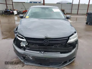 2013 Volkswagen Jetta SE with VIN 3VWDX7AJ1DM443139, listed as a IAAI auction lot 42471738 with 77,578 mi miles and . Bid and sale history available at DreamBid. Image 12.