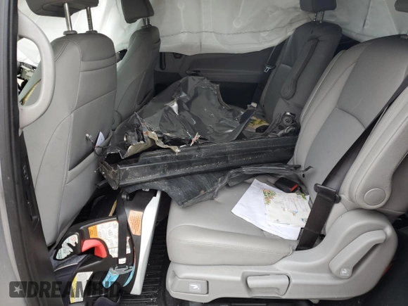 2019 Honda Odyssey EX-L z VIN 5FNRL6H7XKB049729, wystawiony jako Copart lot #55953075 z przebiegiem 129 194 mil mil oraz Szkoda całkowita • Salvage title. Historia ofert i sprzedaży dostępna na DreamBid. Obrazek 11.