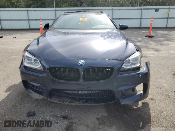 2015 BMW M6 with VIN WBSLZ9C59FD651474, listed as a Copart auction lot 60882454 with Not provided miles and Salvage title. Bid and sale history available at DreamBid. Image 5.