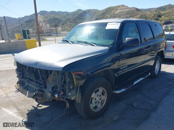 2001 Chevrolet Tahoe LT with VIN 1GNEC13T31R122882, listed as a IAAI auction lot 41999271 with 211,687 mi miles. Bid and sale history available at carsss.com. Image 21.